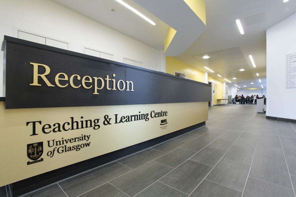 NHS Glasgow flat cut text signage.