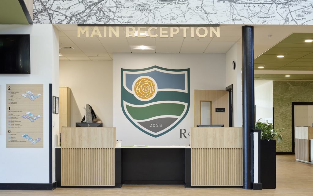 Wallyford Learning Campus digitally printed vinyl school logo applied to reception wall