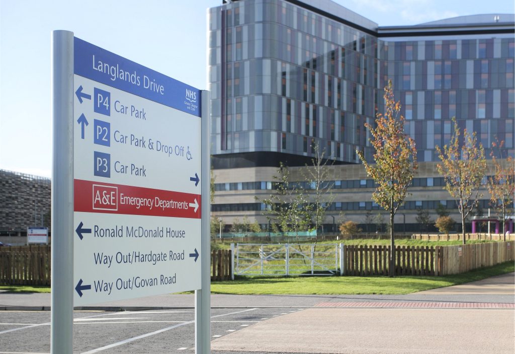 NHS Queen Elizabeth University Hospital external post mounted sign panel. directional sign.