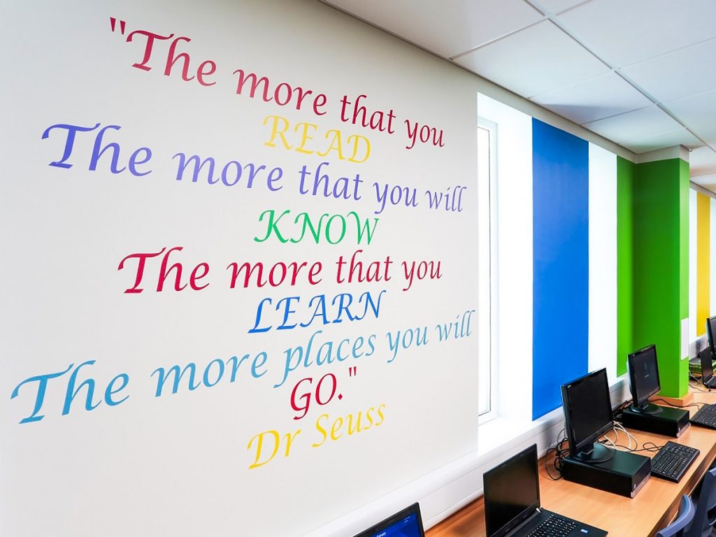 St Patricks Primary School multi colour cut vinyl text Dr Seuss quote applied to a white painted wall within a classroom